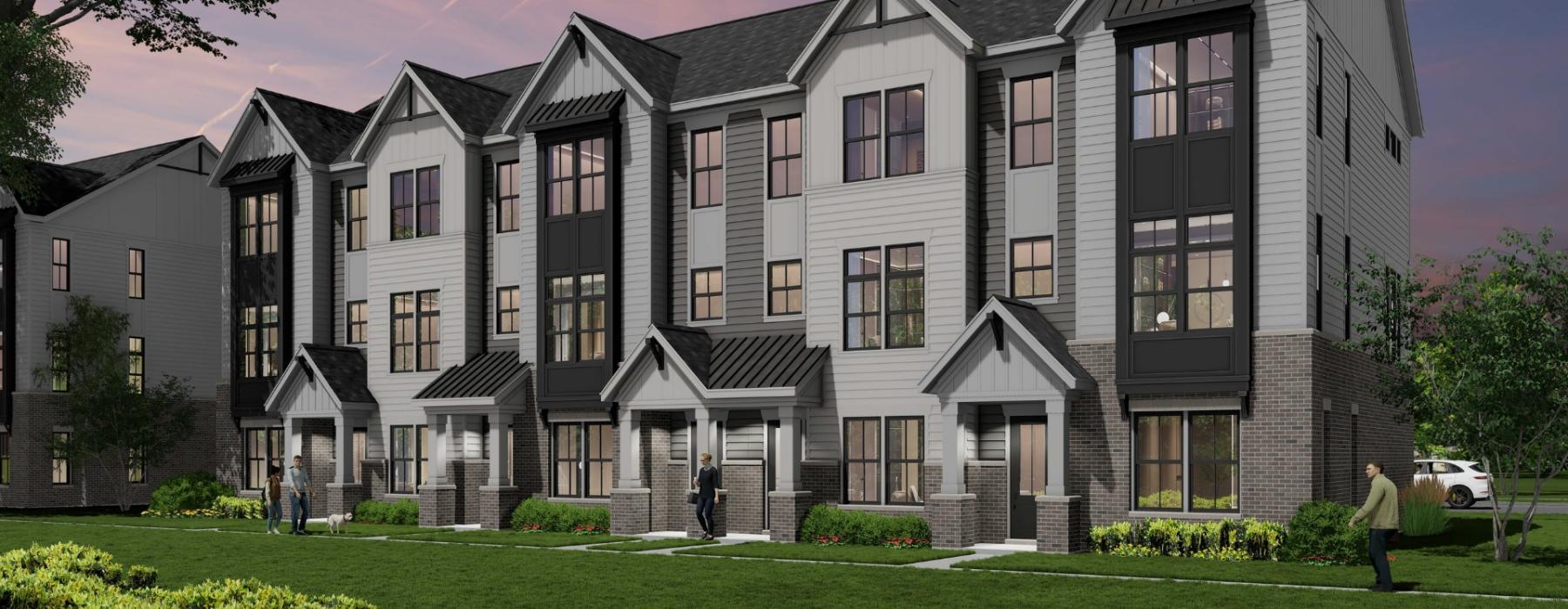 a large building with a lawn in front of it